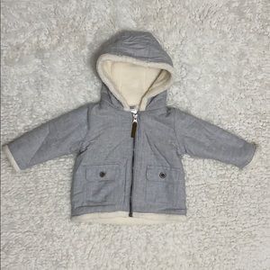 Baby boy’s warm jacket with fleece lining.